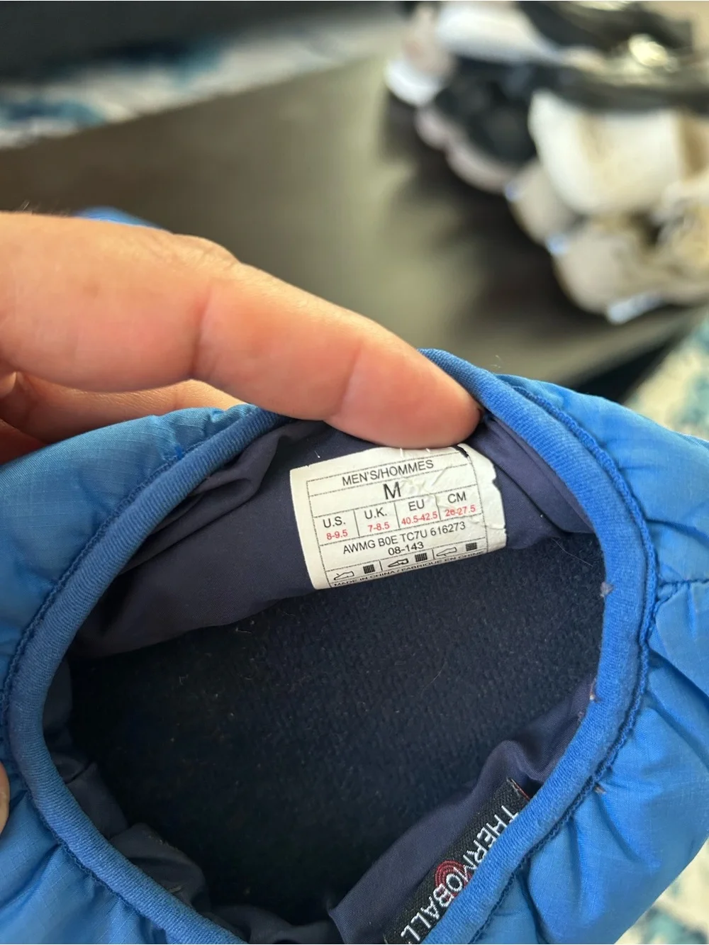 The North Face men’s ThermoShoes - Blue Cozy Slip-Ons